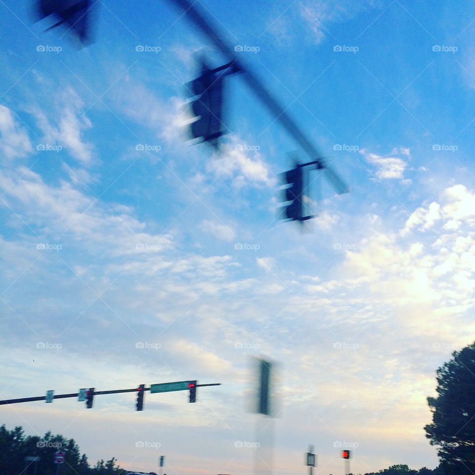rush at the intersection, but the sky remains calm