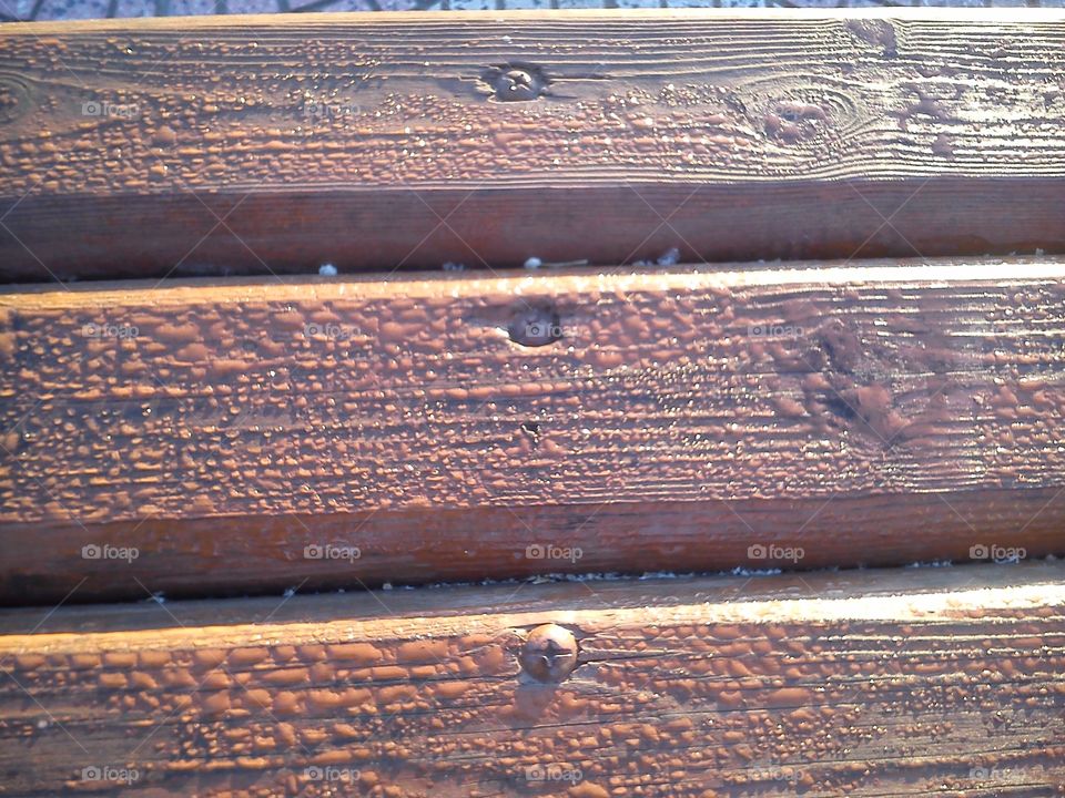 Wooden Bench and Drops of Water