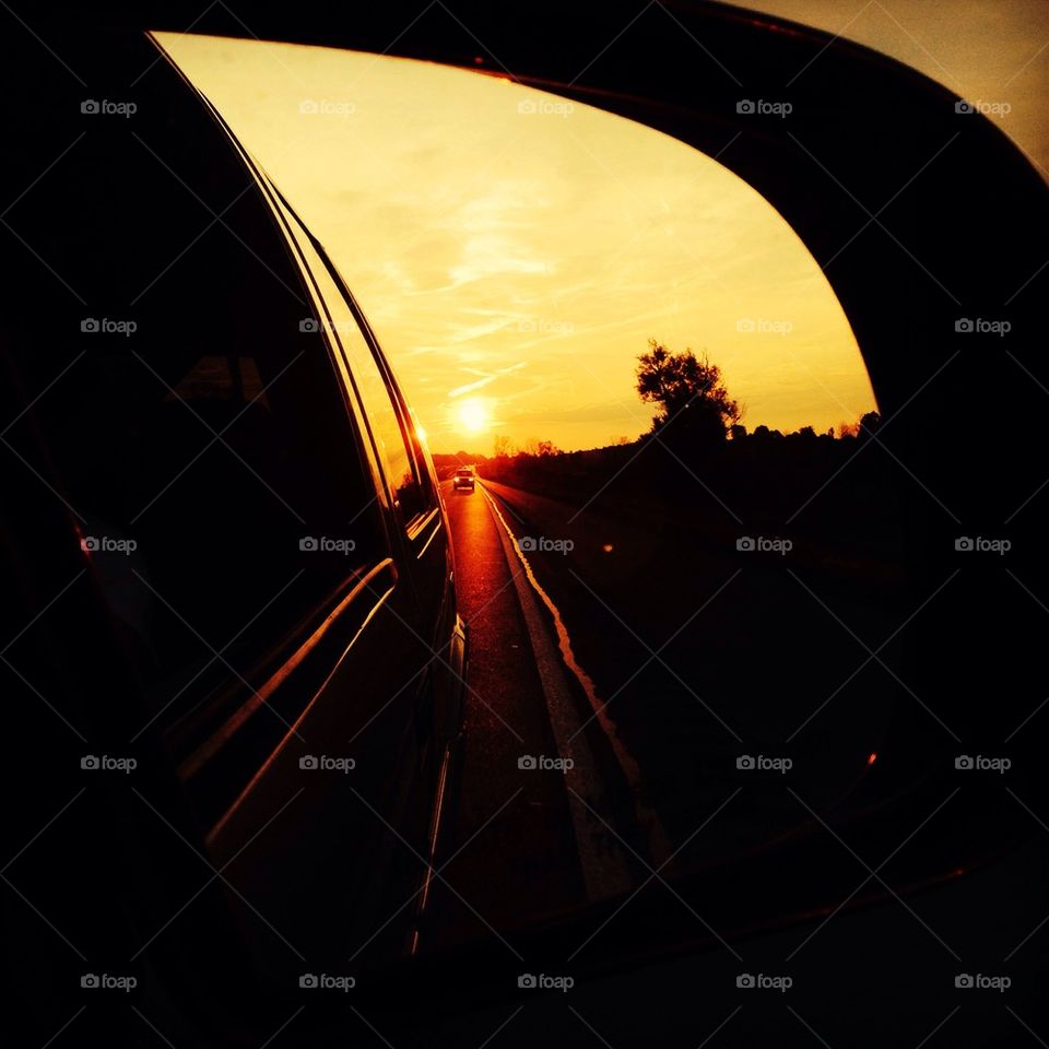 Side mirror sunset
