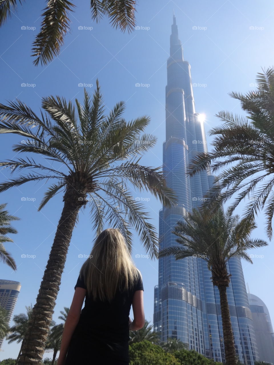 Business trip to Dubai, looking up at the Burj Khalifa, world's tallest building. 