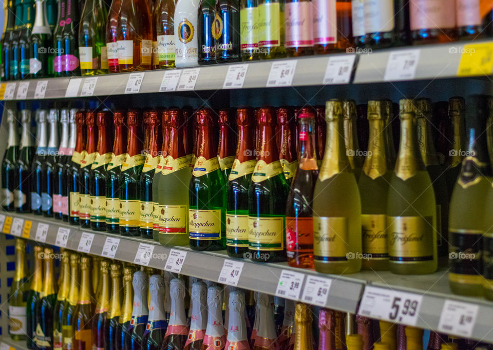 shop poles with different types of wine