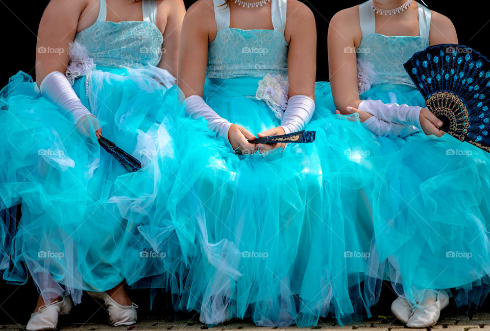 3 ballerinas in blue dresses