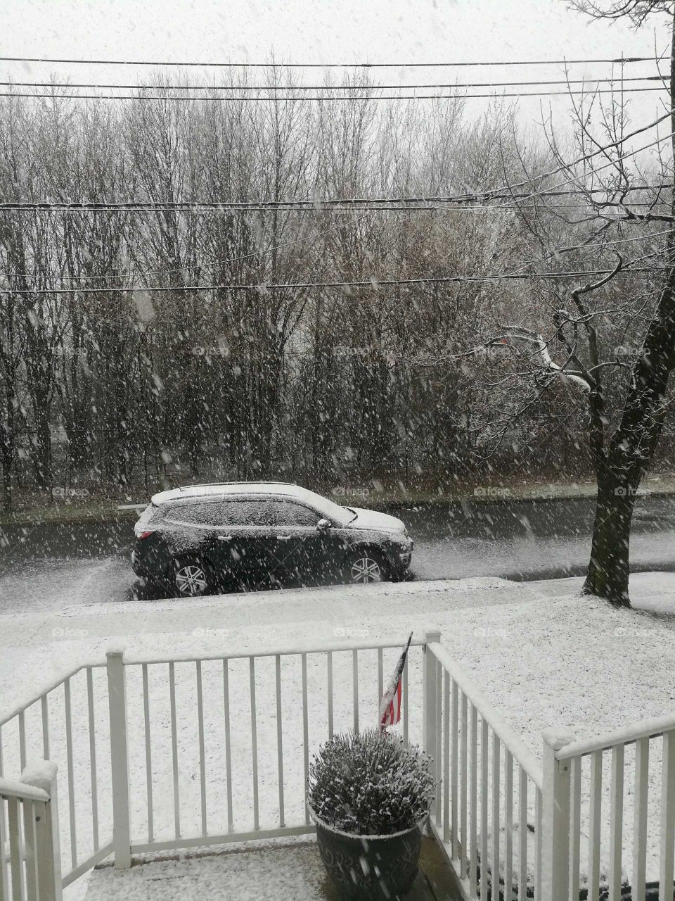 Chevy covered in snow dust