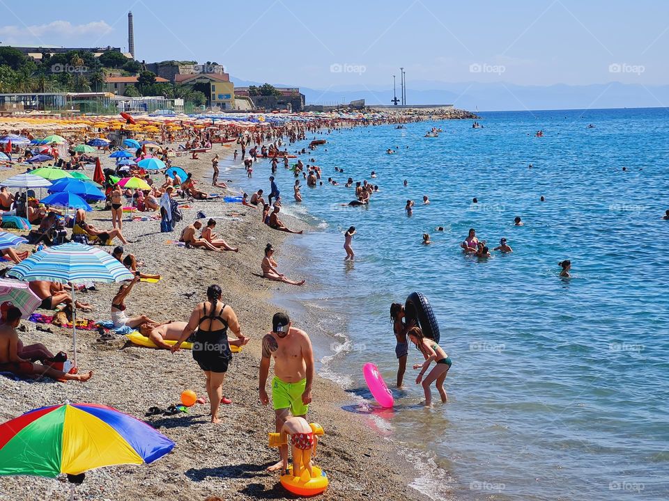 Savona beach crowded with tourists