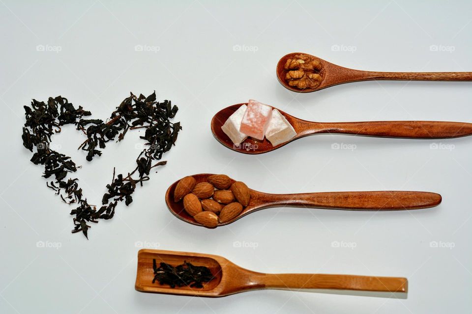 food in wooden spoon