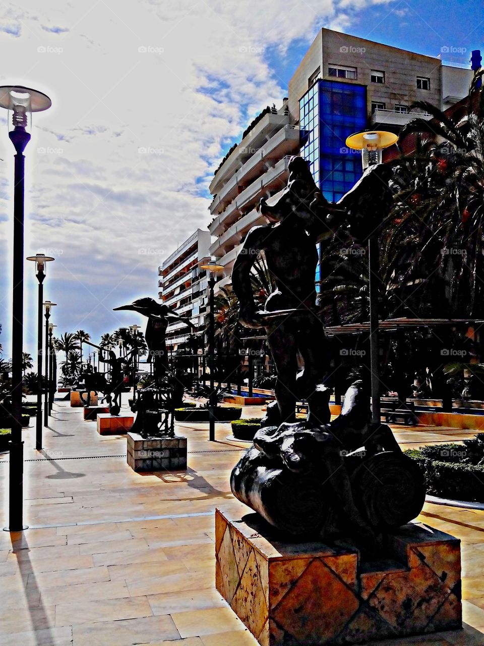 Salvador Dalí sculptures at Marbella promenade, Costa del Sol, Spain . Salvador Dalí sculptures at Marbella promenade, Costa del Sol, Spain