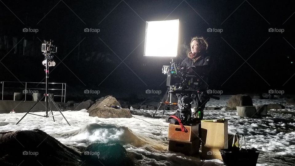 lady on the moon (a camera crew on set)