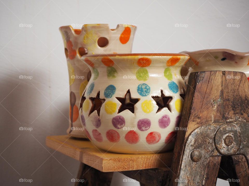 Clay pot with polka dots and stars