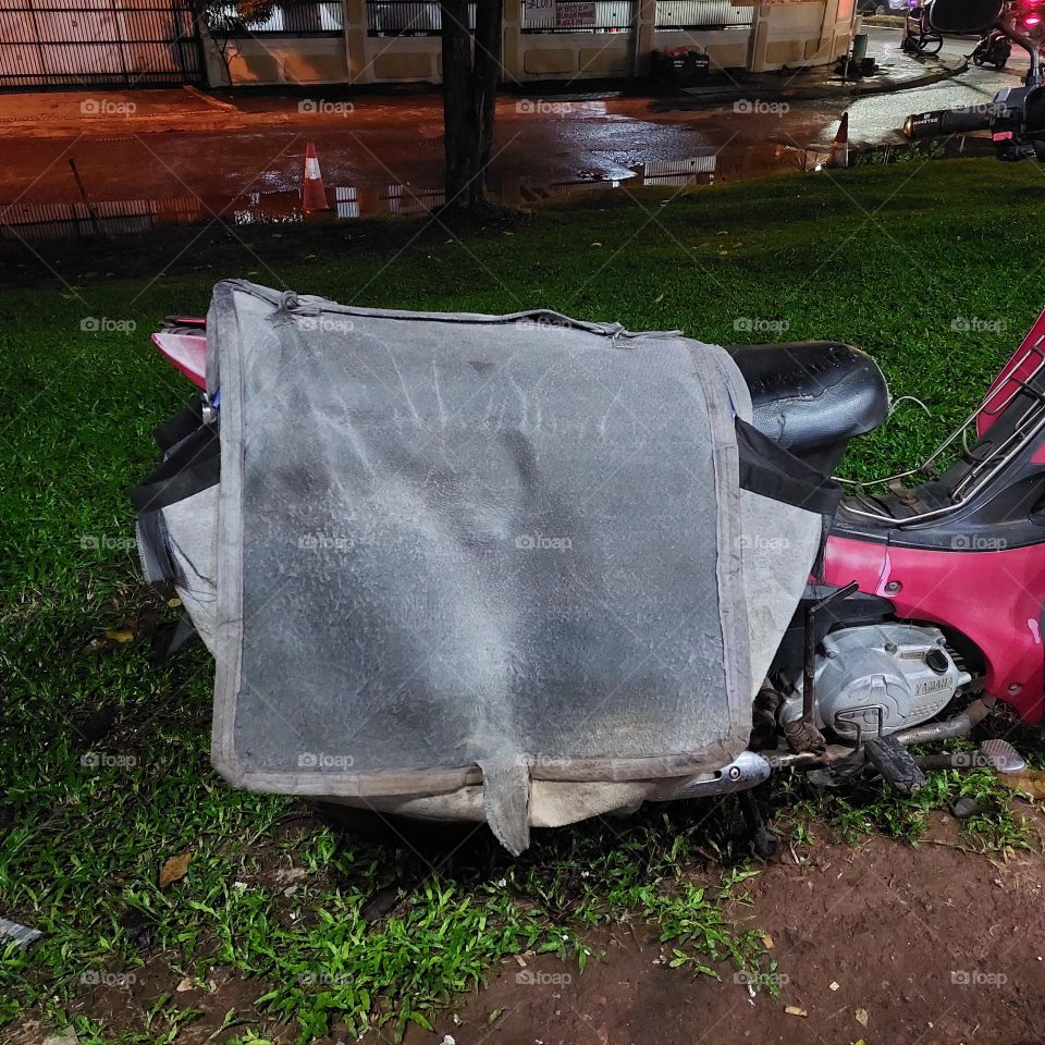 a motorcycle fitted with a tool for carrying goods on the back