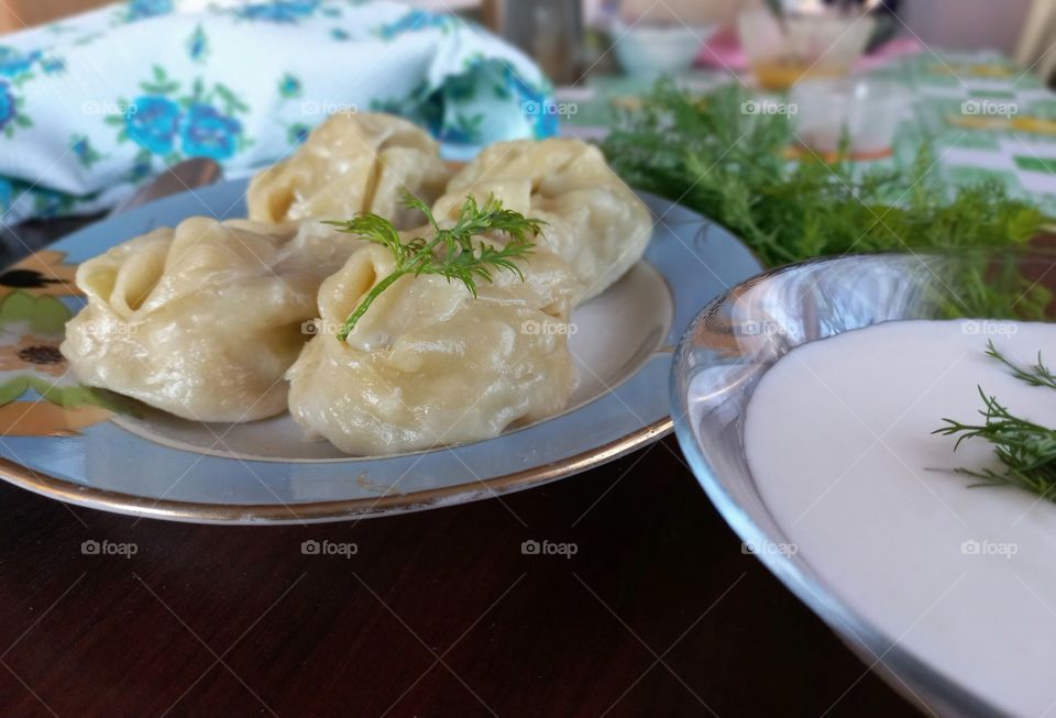 for lunch there were minced beef manti with onions, kefir and greens were also served with nim!