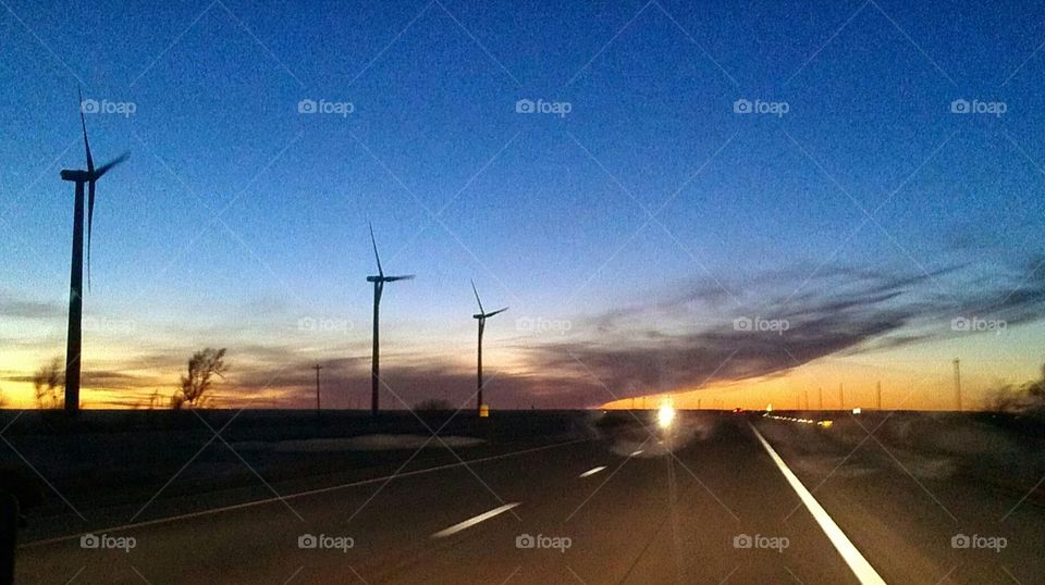 wind turbine sunset . Wilson 