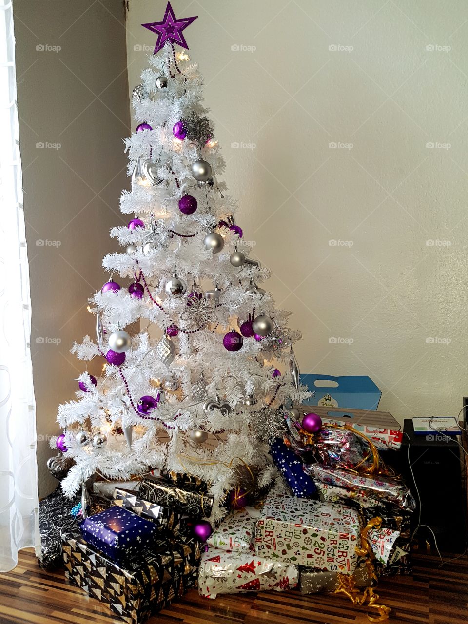 Decorated christmas tree and gifts