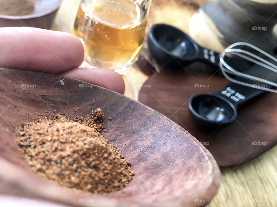 Making homemade facial mask with nutmeg cinnamon and organic honey 