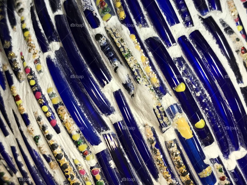 Plaster and colorful glass rods