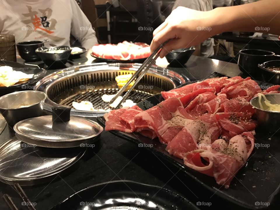 Hot grill, Korean BBQ, grilling on the table. Beef, meat, cooking 