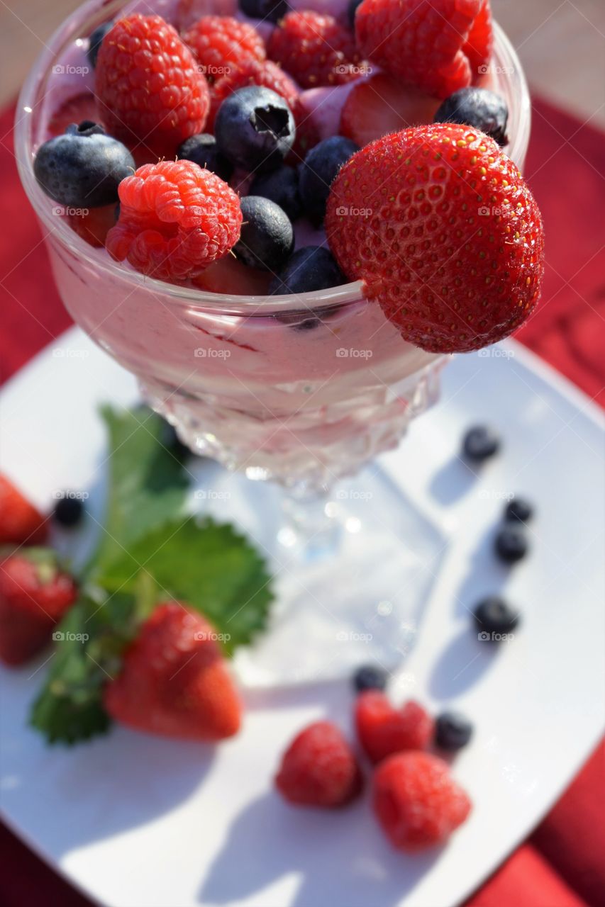 Berry smoothie garnish with fruits