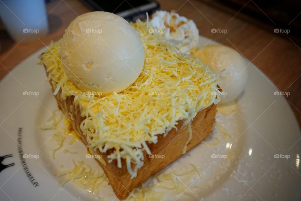 ice cream topped with cheese