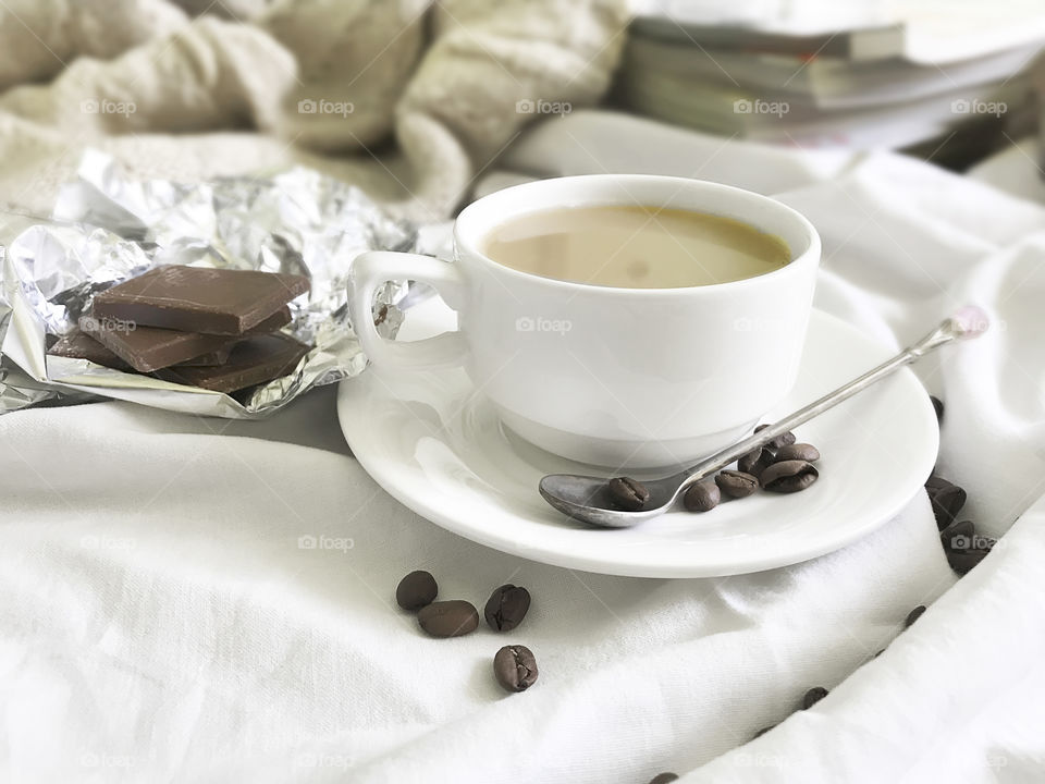 Coffee cup with milk and chocolate 