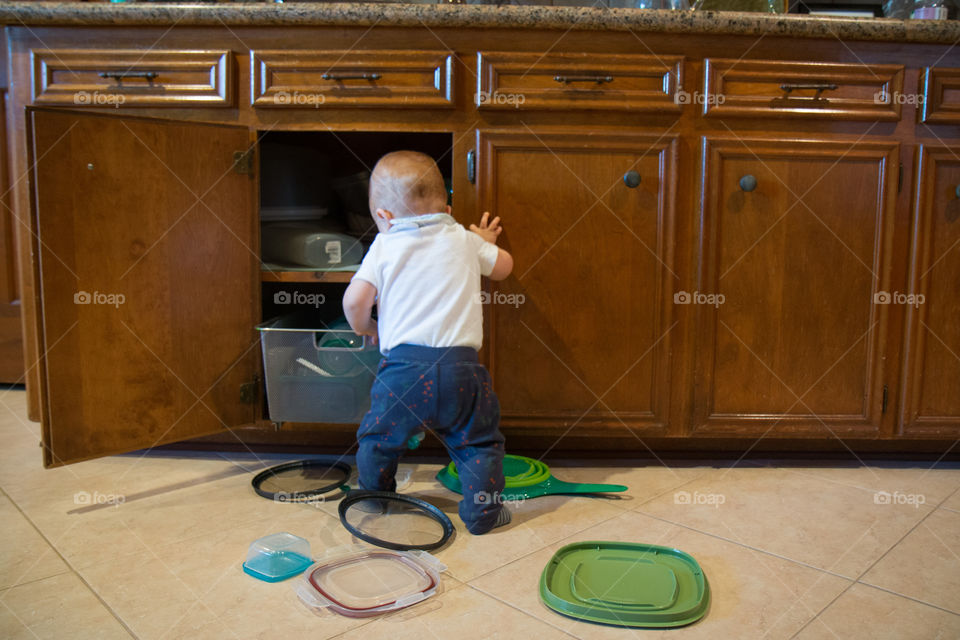 Rear view of boy child playing