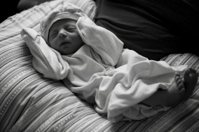 High angle view of sleepy baby