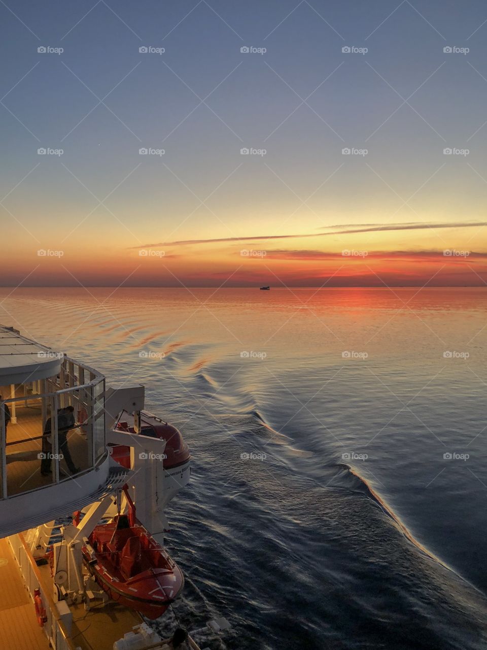 View of a beautiful sunset of a cruise ship ,in Baltic Sea