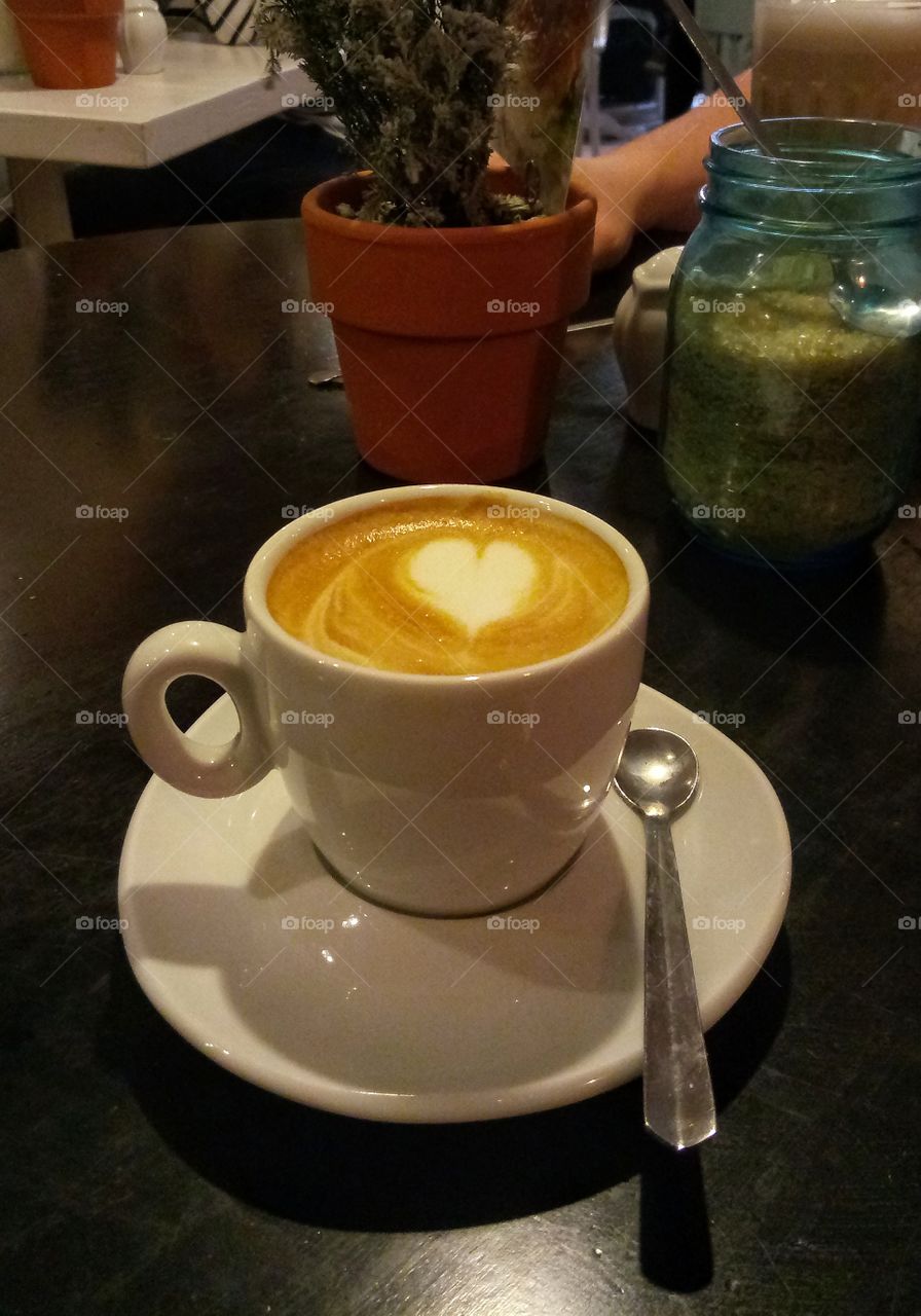 hot cappuccino in cafe