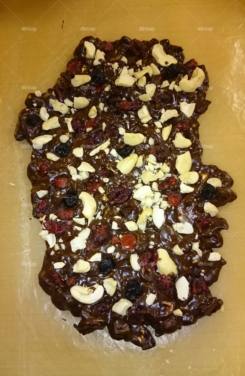 homemade chocolate bite with dried fruit and nuts