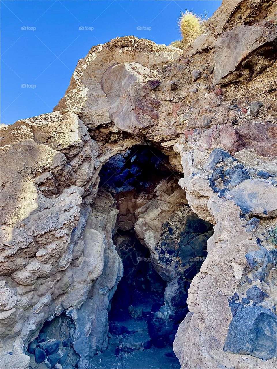The “Uyuni” Salt Lake in “Bolivia”, South America is huge and its ample deposits cover vast regions. Statues are made from the material and there are many cavernous openings such as this one. 2022. Hypnotic Productions