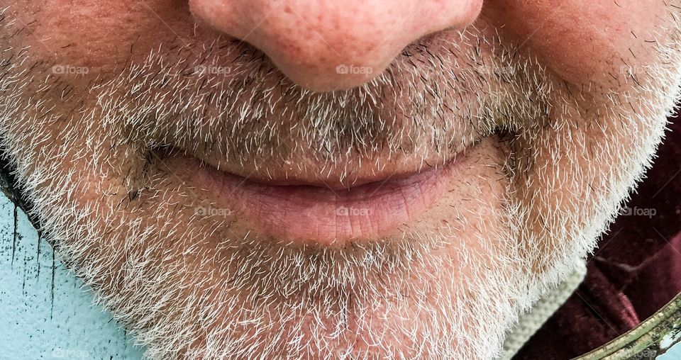 Closeup lower face man with grey beard and moustache 