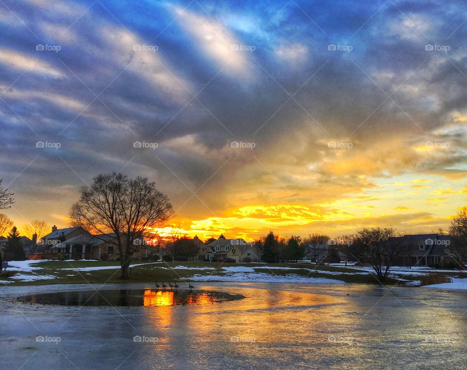 Frozen lake at the time of sunset