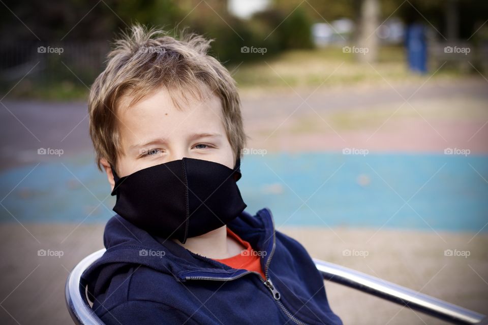 Boy wearing a mask