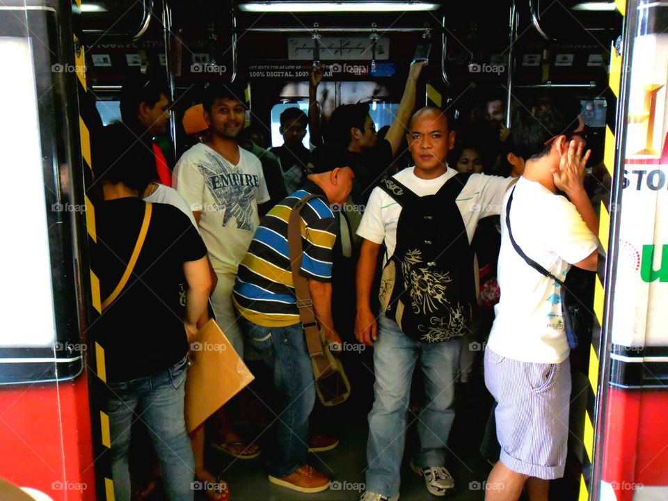 passengers or commuter inside a train manila, philippines in asia