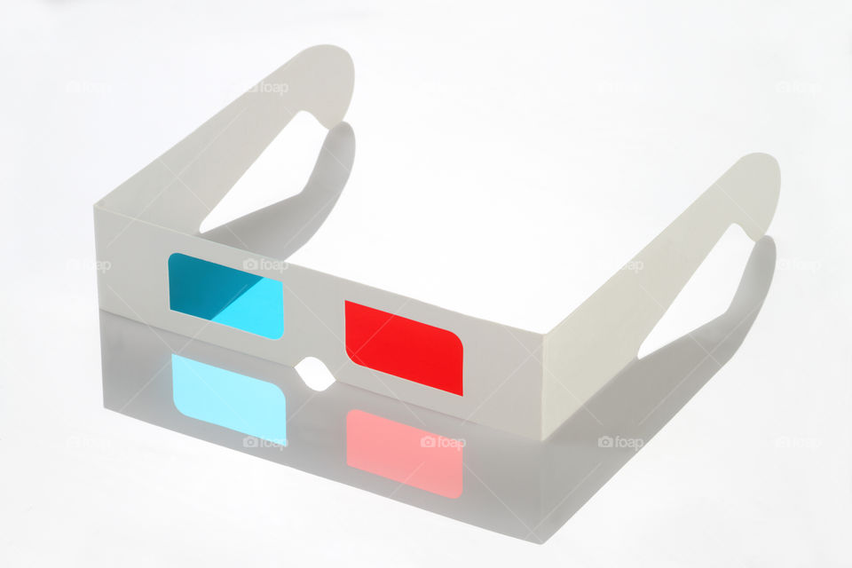 3d glasses on white reflective background