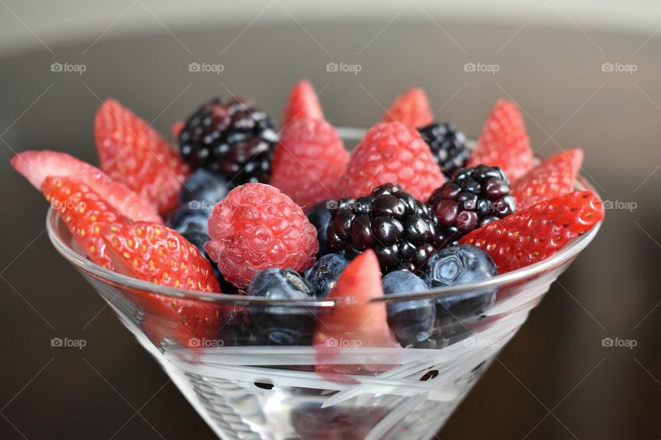 blueberries blackberries raspberries strawberries fruit Bowl martini glass