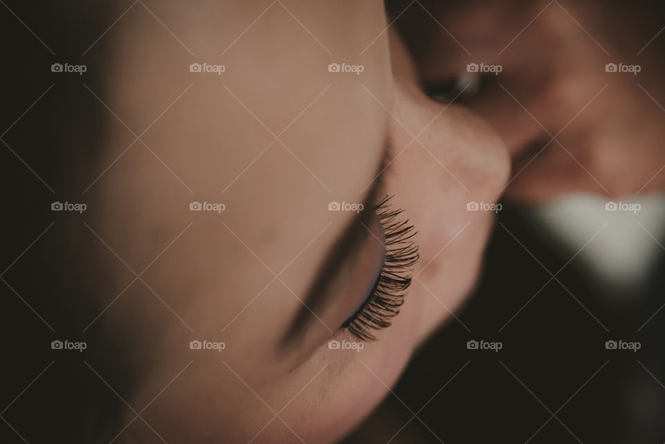 A face makeup processing on Asian female, closeup on eyelashes