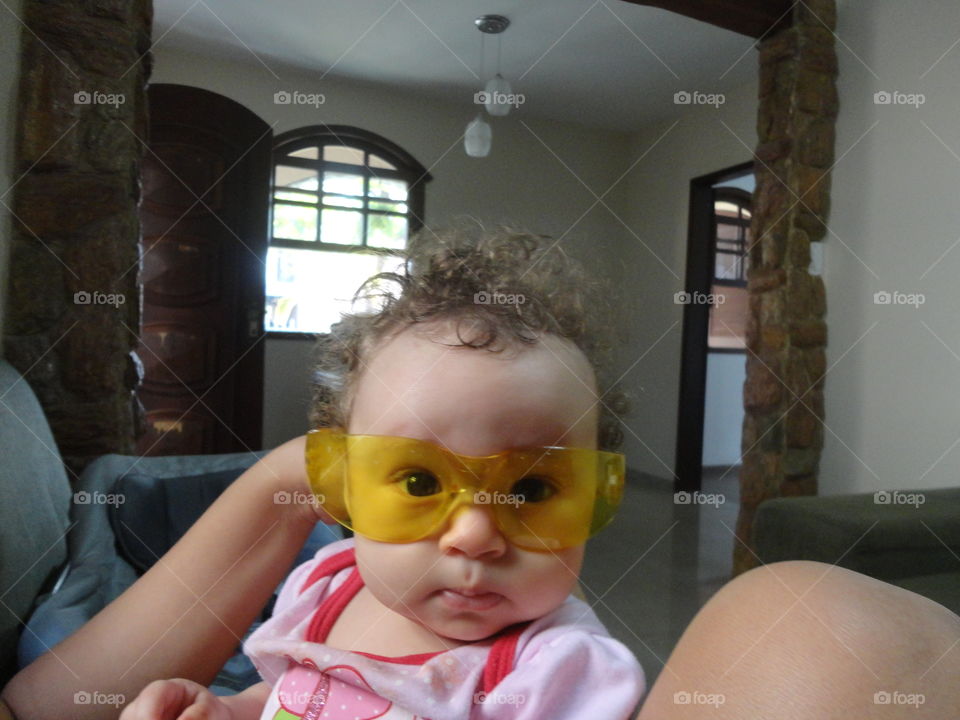 Portrait of cute baby wearing eyewear