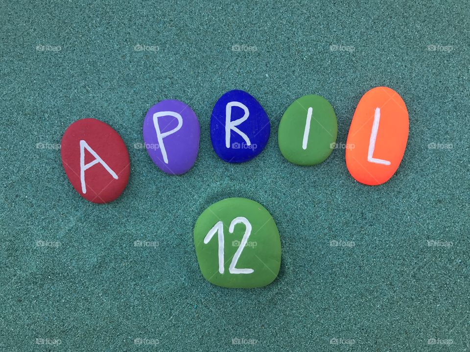 12 April, calendar date with colored stones 
