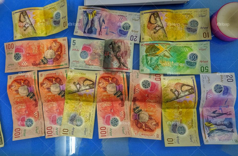 Colourful bank notes of Maldivian currency 5,10, 20, 50, 100 rufiya