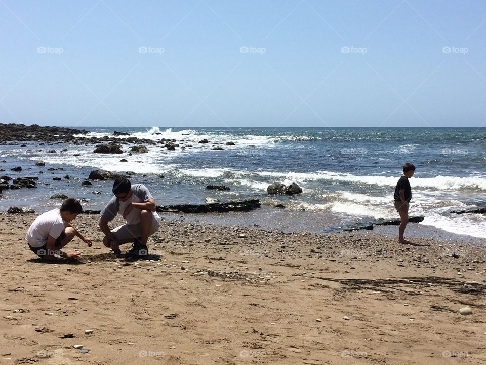 Beach day- playing in the sand