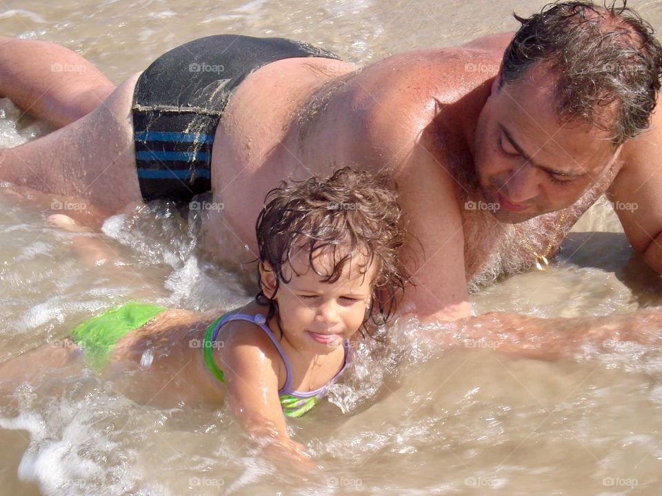 Father and daughter at sea