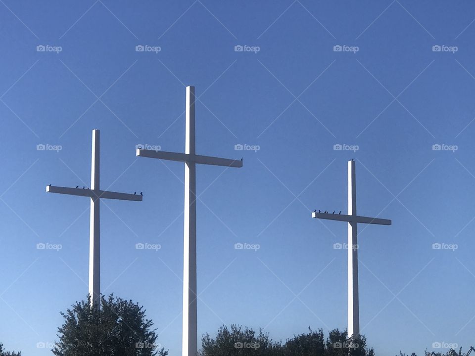 Three Crosses on a Blue Sky