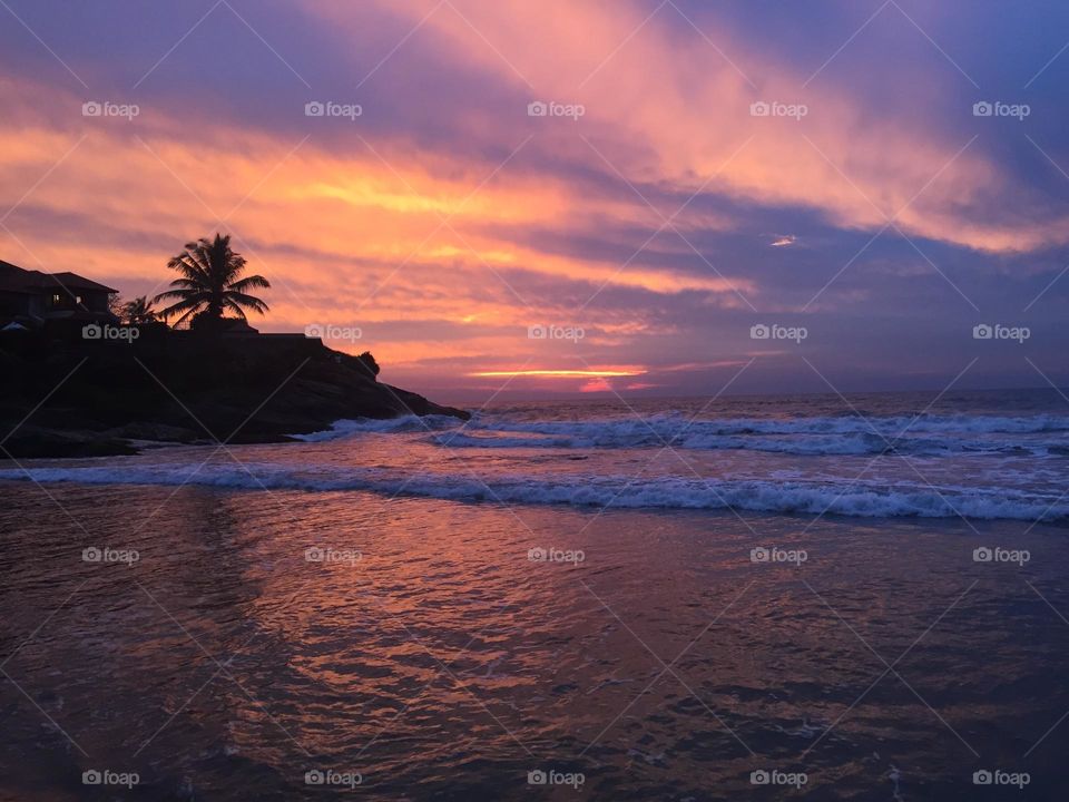 Beautiful colourful sunset at the tropical beach 
