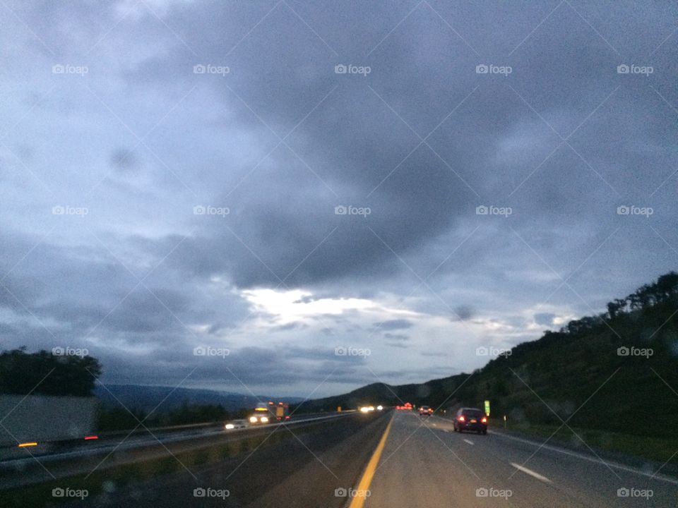 September 14, 2017 sky Driving Mountain Rd., Dotz car truck pavement asphalt lights tree sky clouds fast speeding workmorning commute rushing falling racing