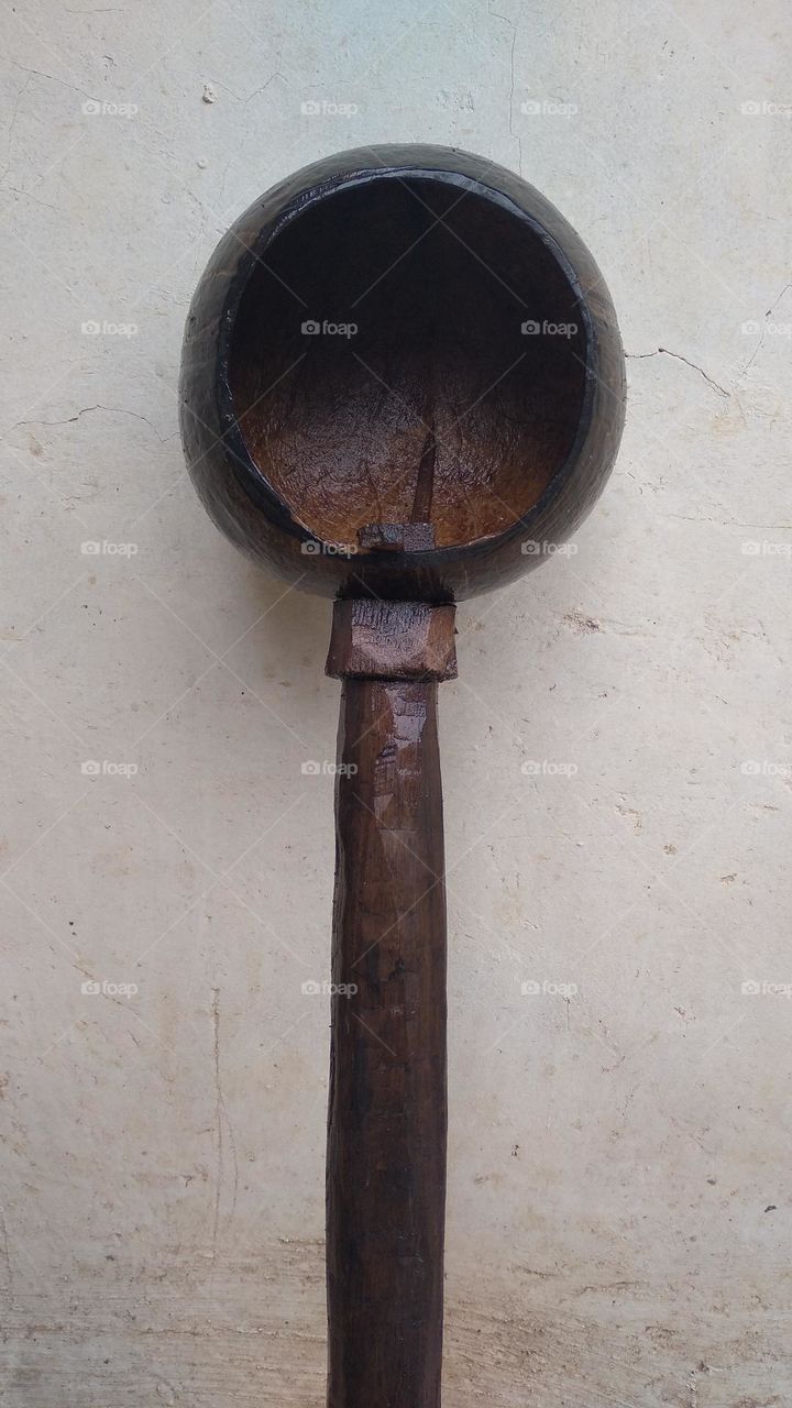 The ancient dipper is made of coconut skin and wood