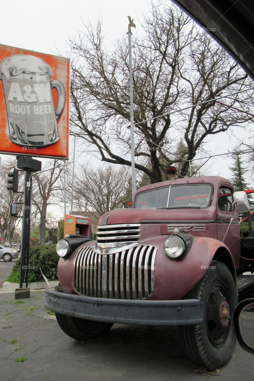 Old truck by an old A&W sign