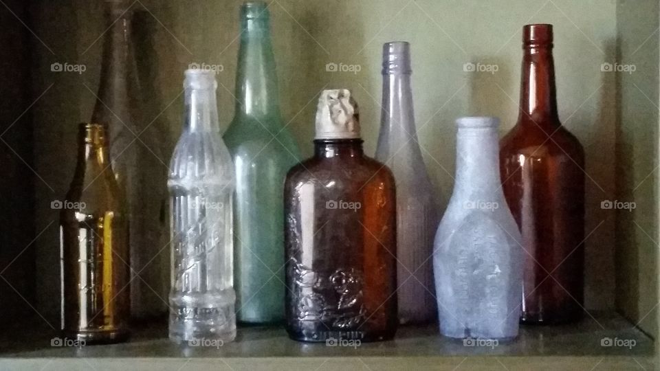 Vintage. Old vintage bottles my great-grandfather found out in the hills hunting.