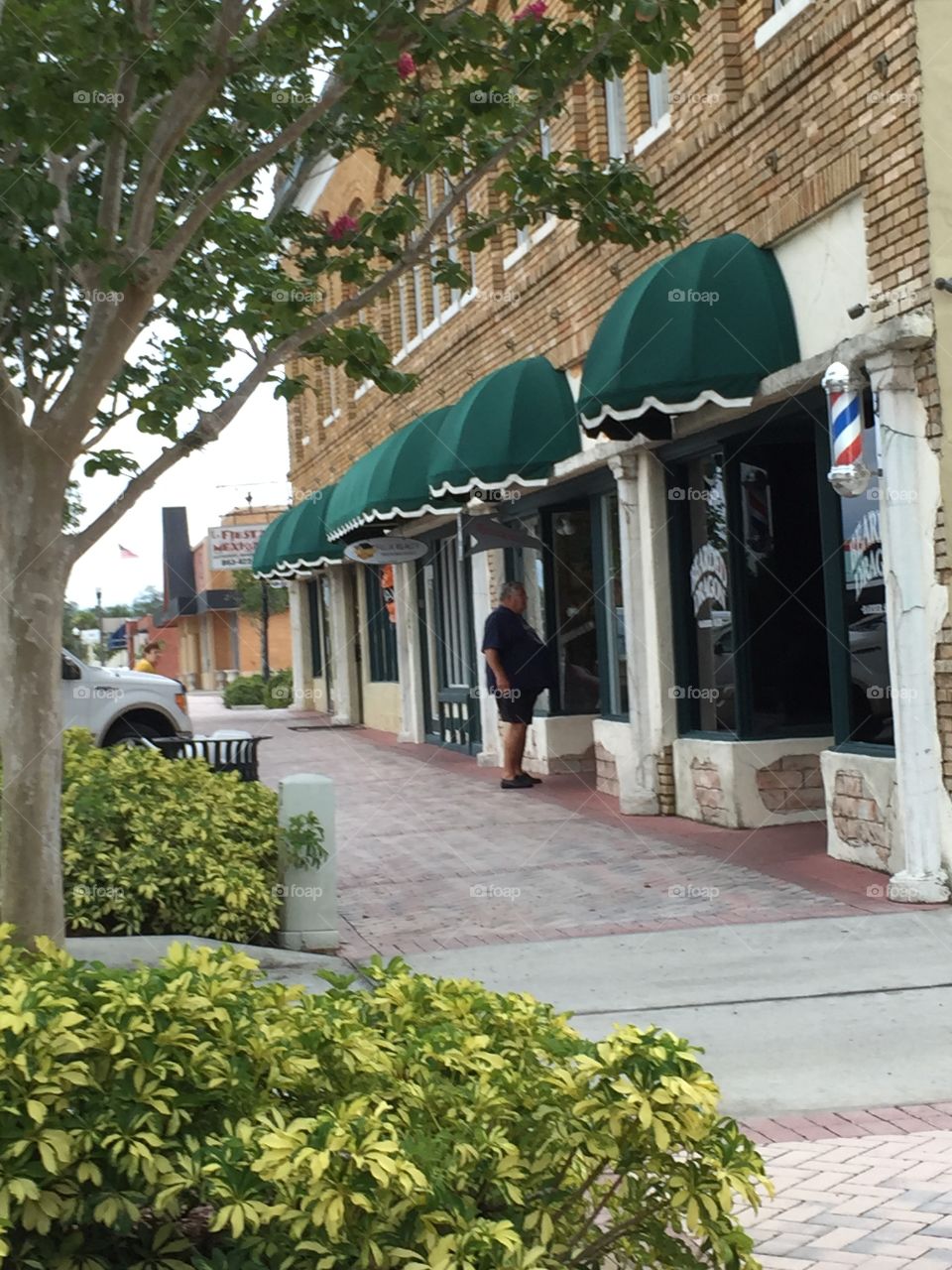 Sunday in Haines City. The green awnings of Haines City, Florida. August on Sunday afternoon in 2015
