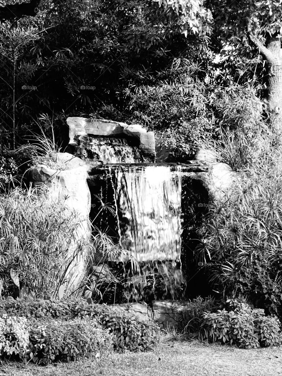 Tiny man made waterfall.