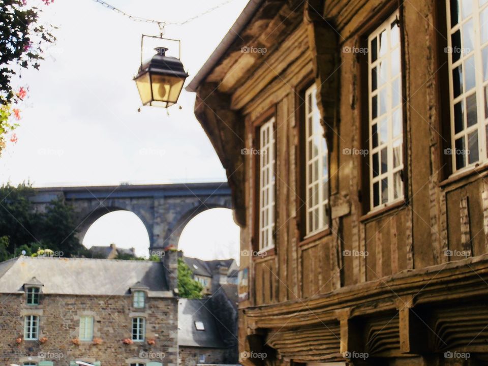 Dinan, antique building and bridge, France 