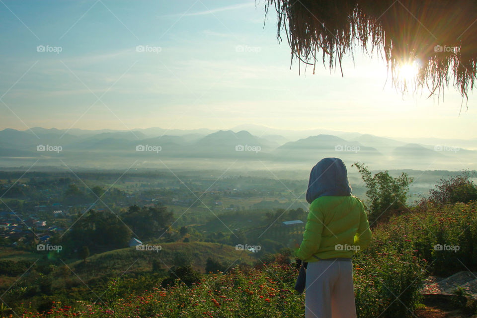 Women standing admiring beautiful nature in the morning.